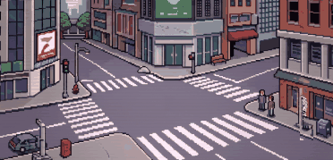 A city intersection: a parked car, pedestrians on the right pavement, traffic lights, a bench and a mailbox.